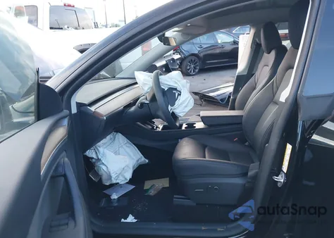 2024 Tesla Model Y from USA, damaged, VIN 7SAYGDEF1RF122502